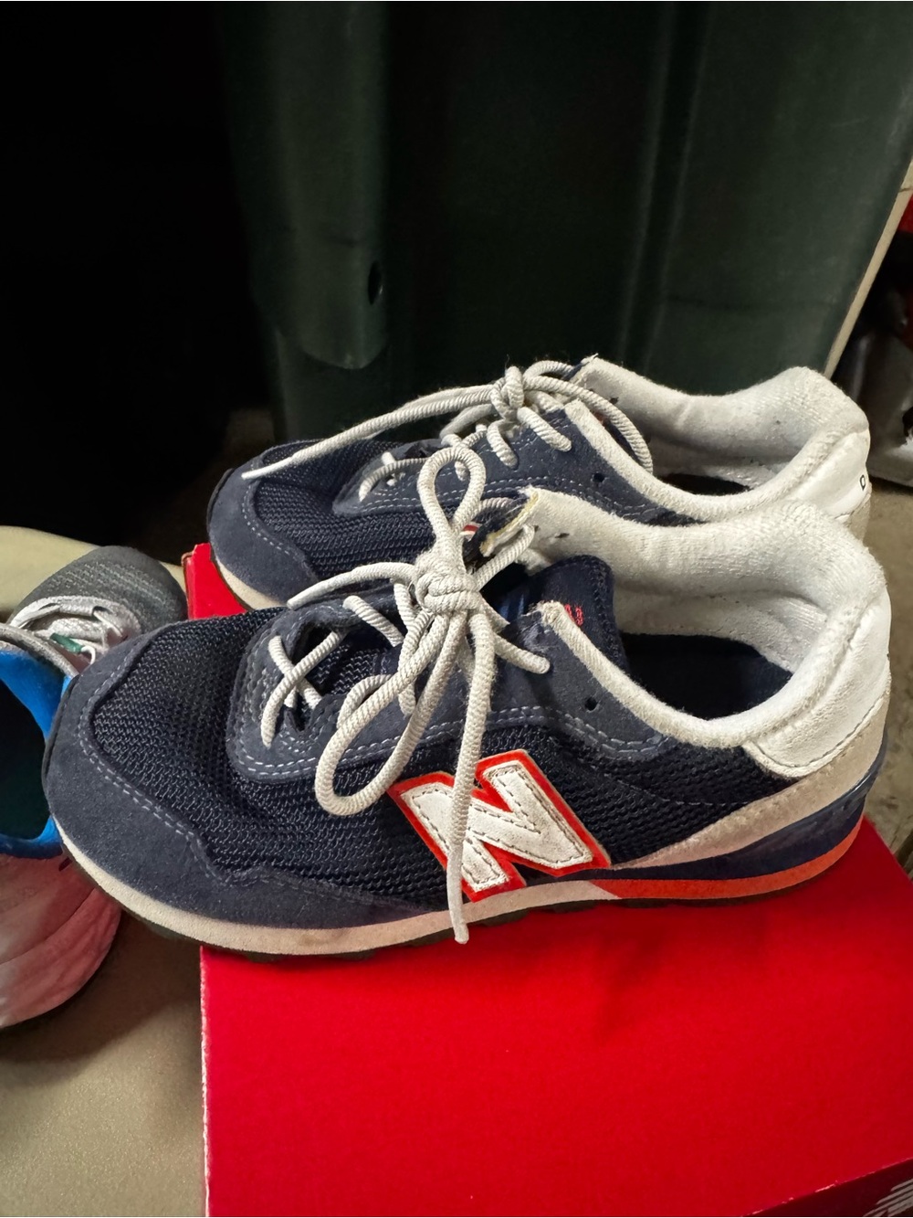 New Balance Kids Navy, Gray and Red Accent Sneakers